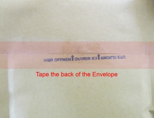 taping the envelope's opening
